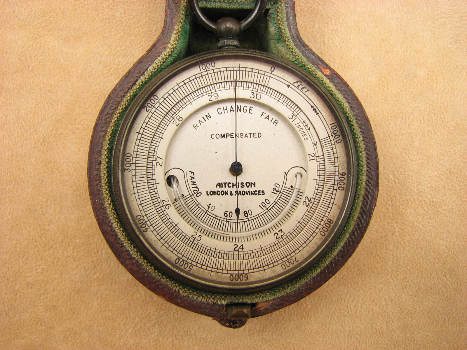 Antique pocket barometer with curved thermometer signed Aitchison London & Provinces